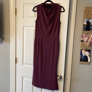 MIDI length, can be dressed up or down. 95% polyester 5% spandex